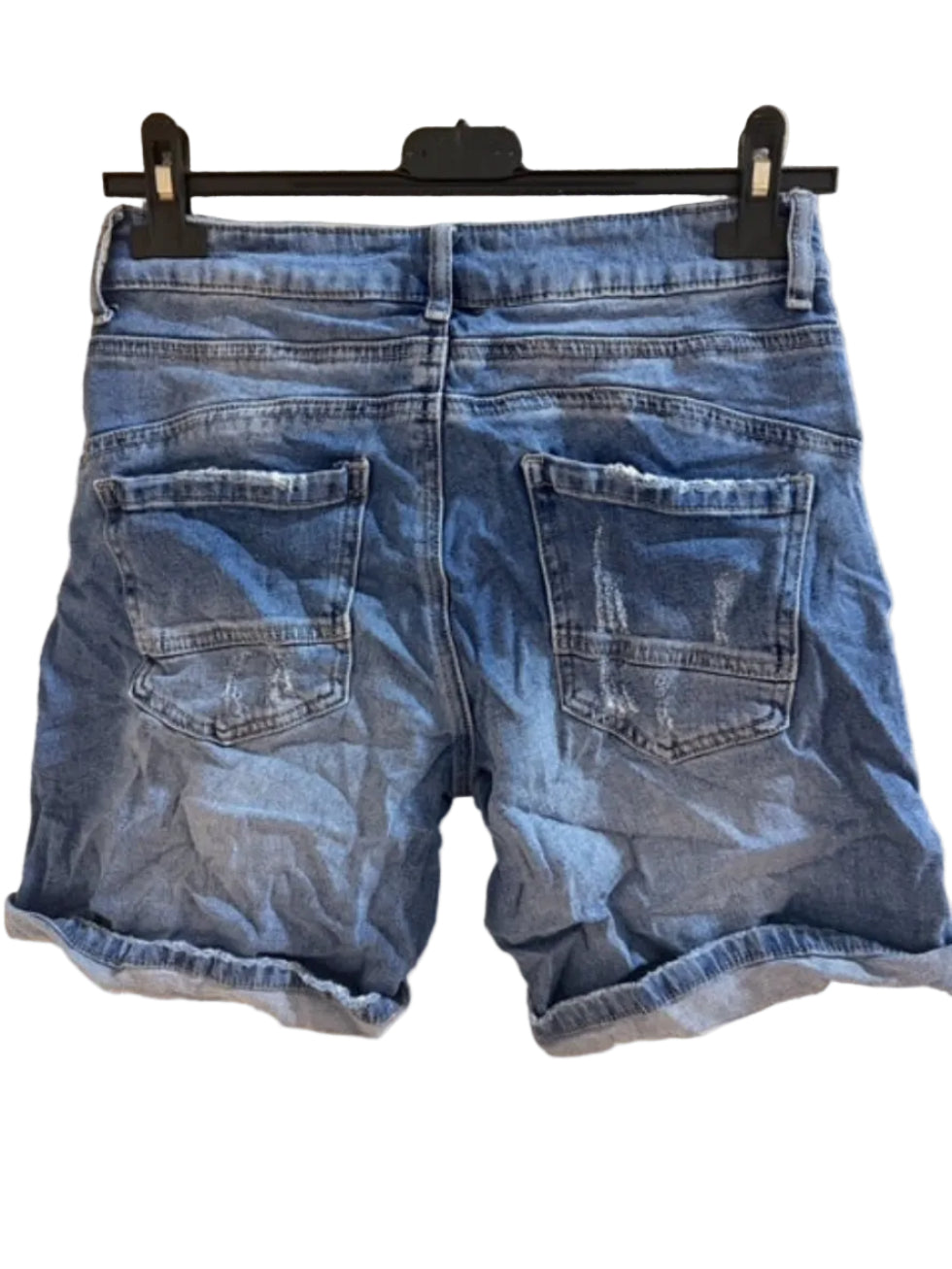 Blue denim shorts on a hanger
