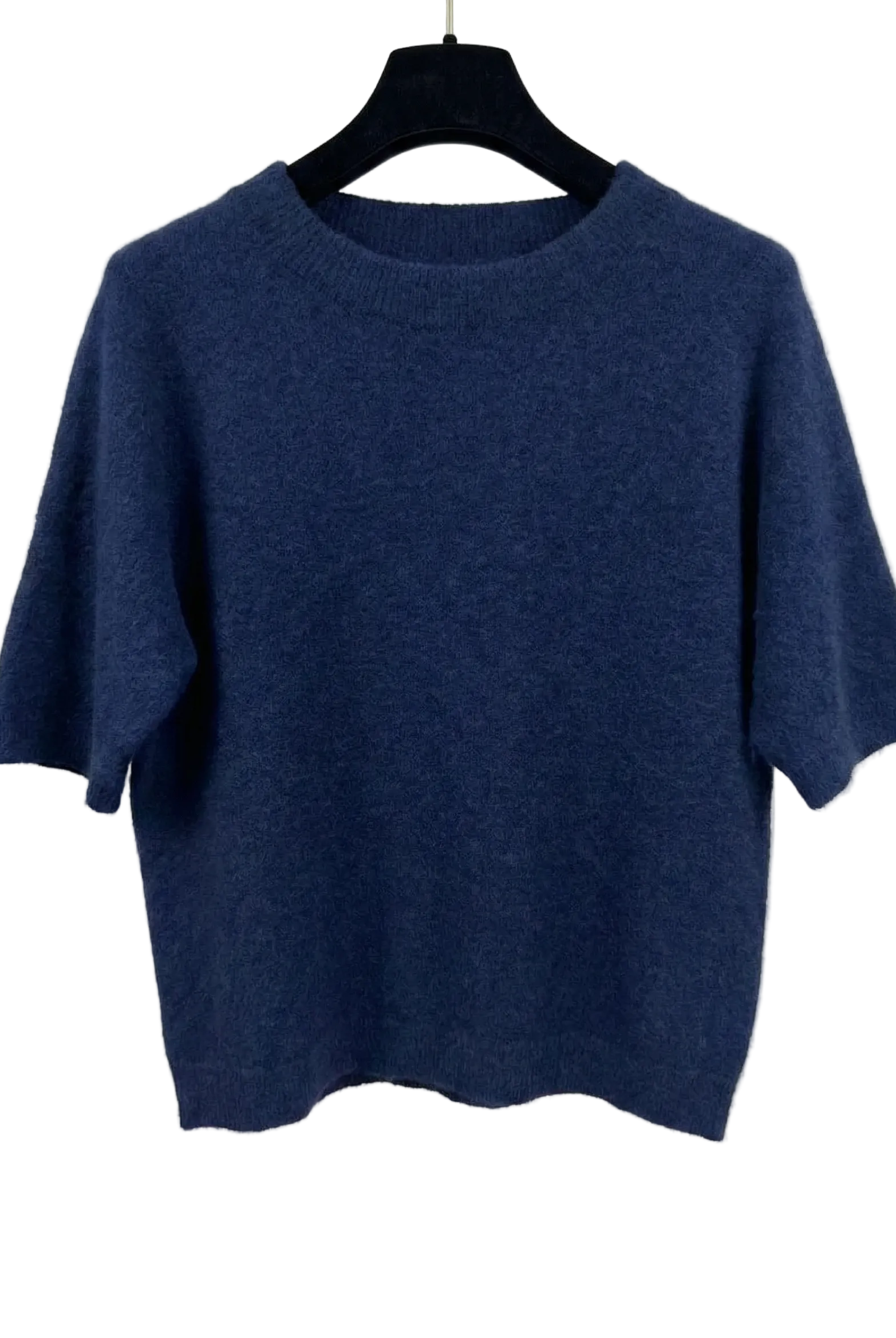 Blue sweater on a hanger against a white background