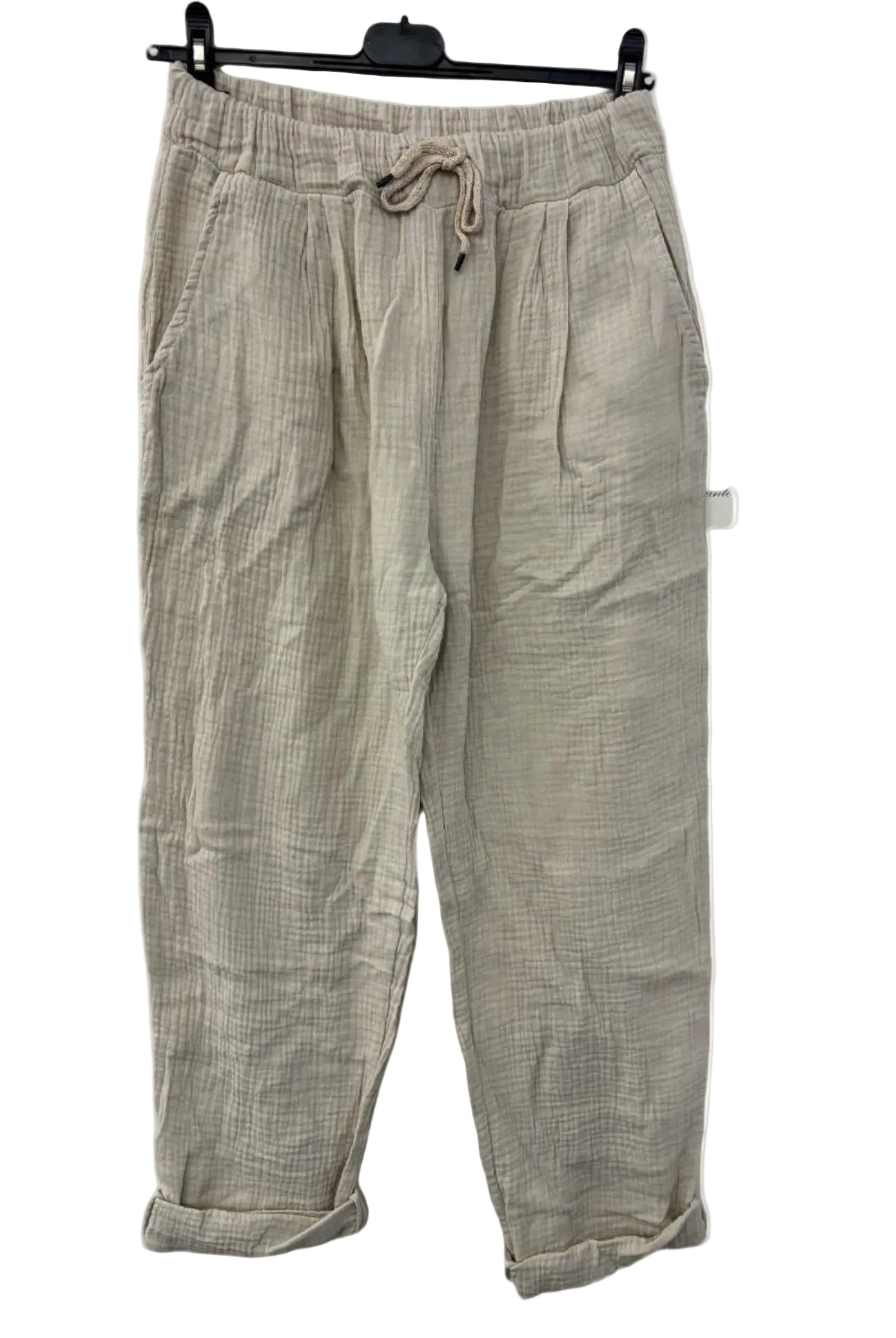 Beige cotton gauze trousers with a drawstring on a white background