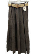 Brown plaid skirt with a belt on a hanger against a white background