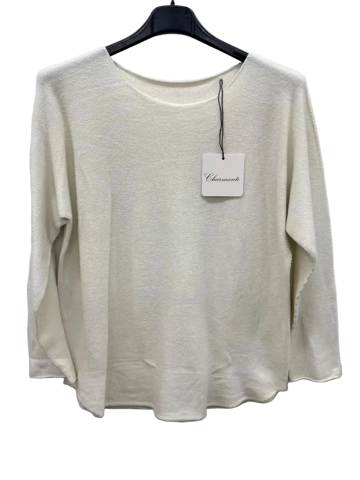 Ecru sweater on a hanger with a tag against a white background