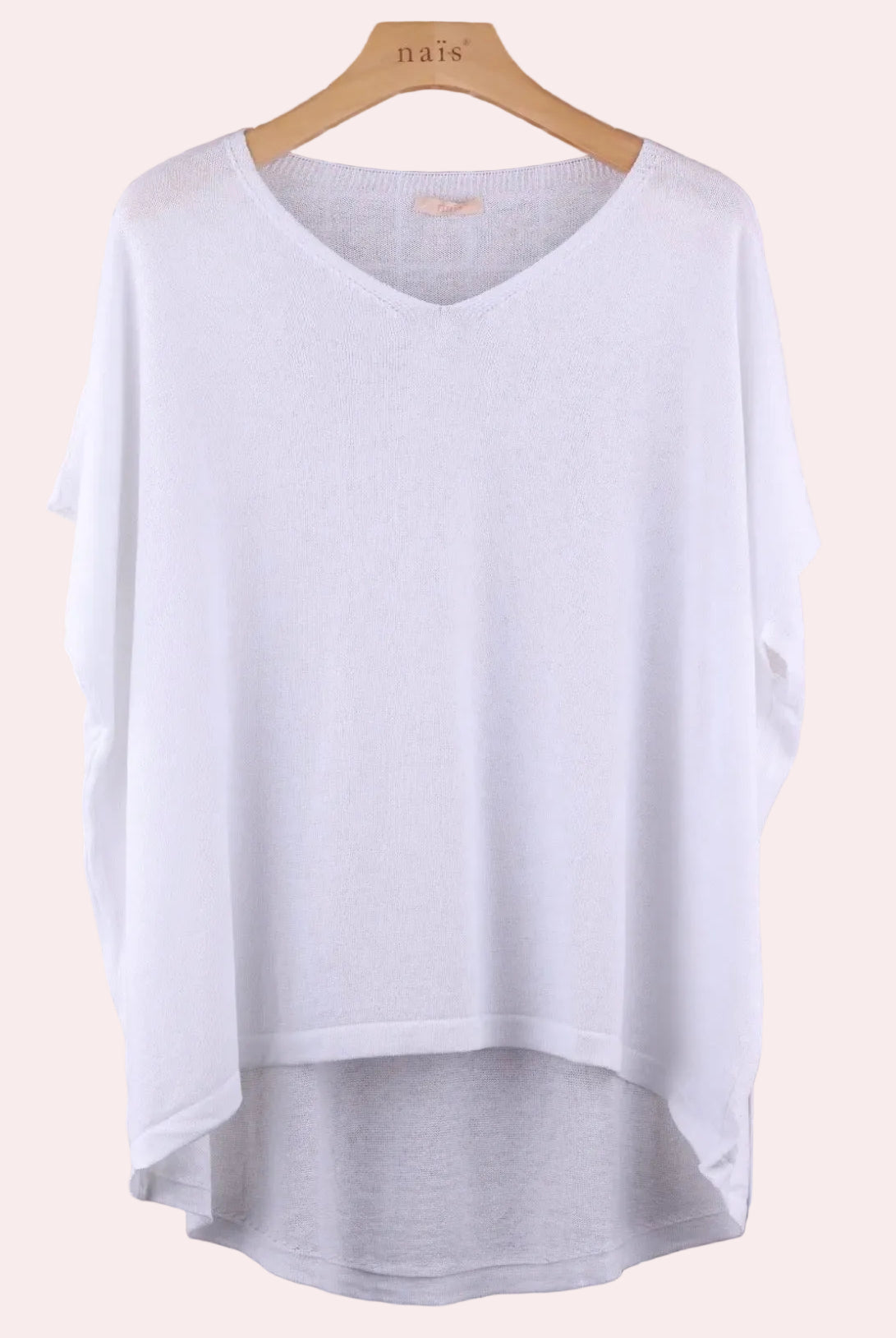 White sweater n a hanger