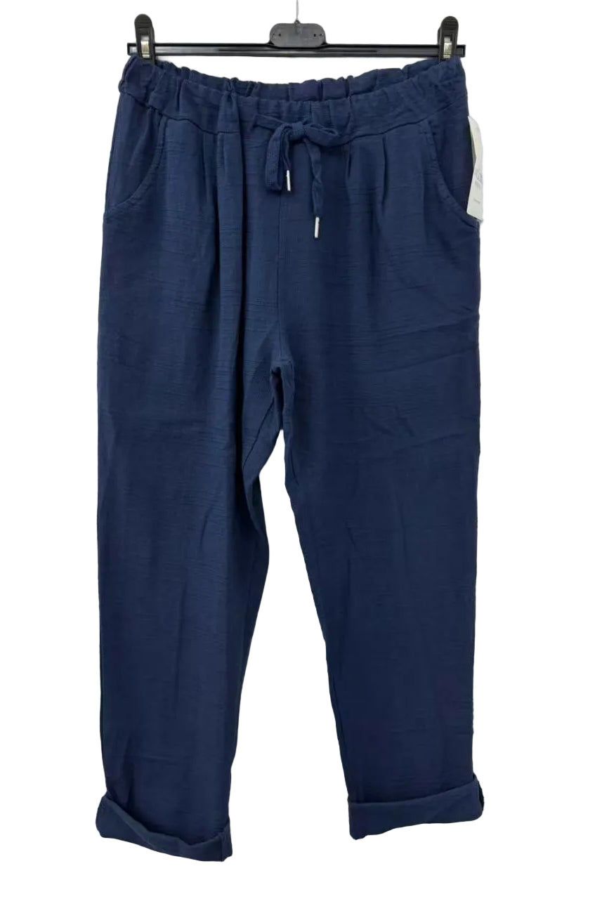 Blue pants with drawstring waist on a white background