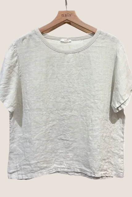 Beige t-shirt on a wooden hanger against a white background