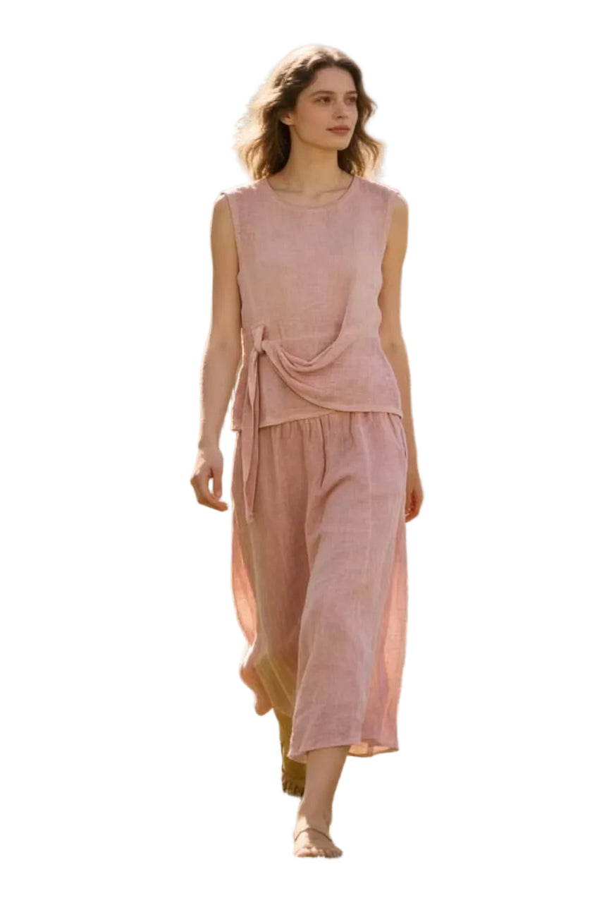 Woman in a rose outfit with a white background
