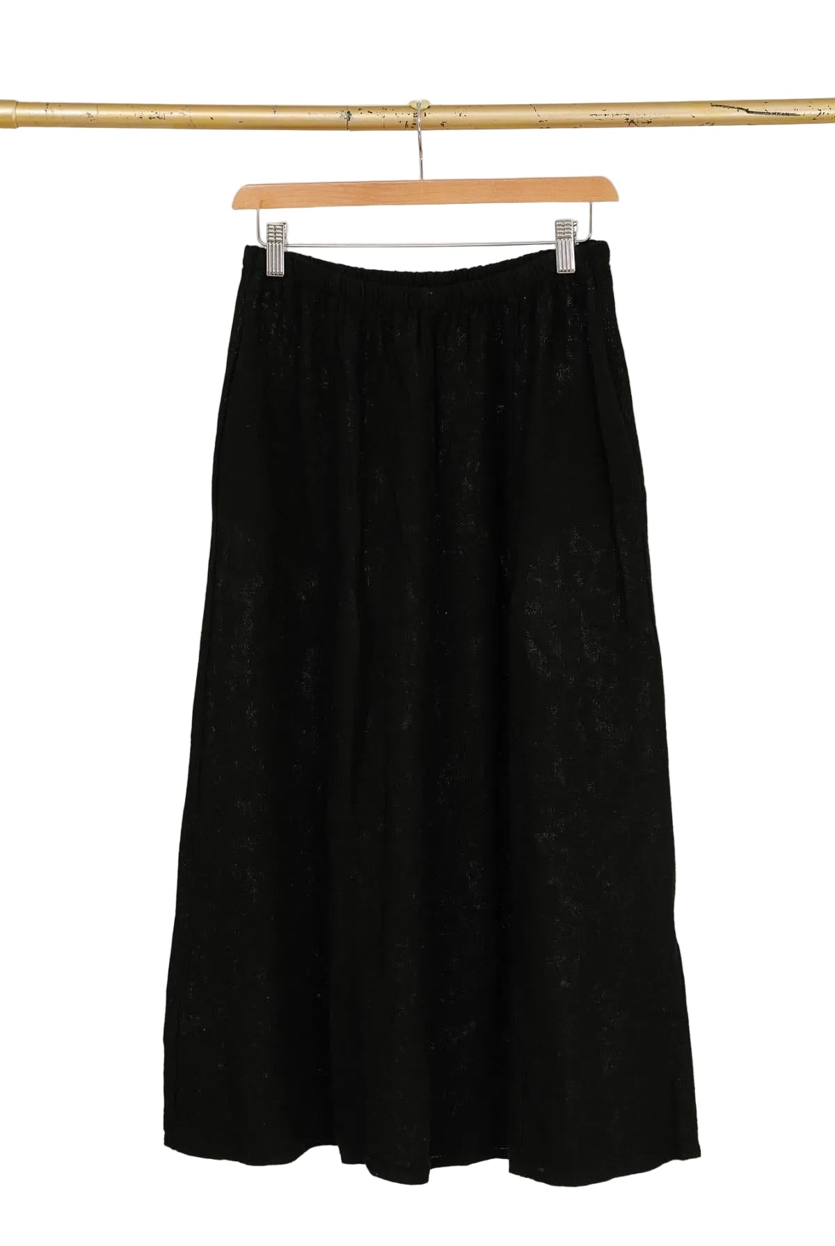 Black linen skirt with white background