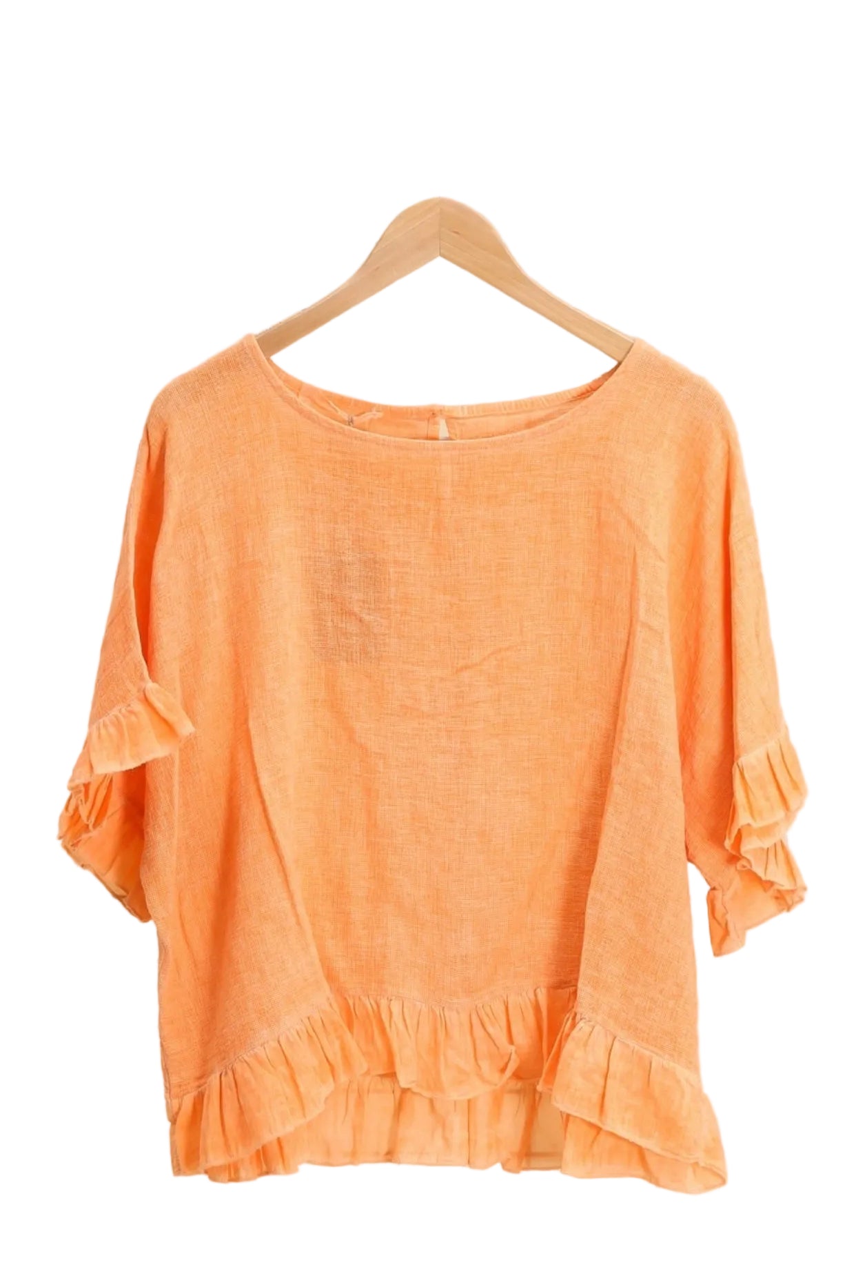 Orange ruffled blouse on a white background