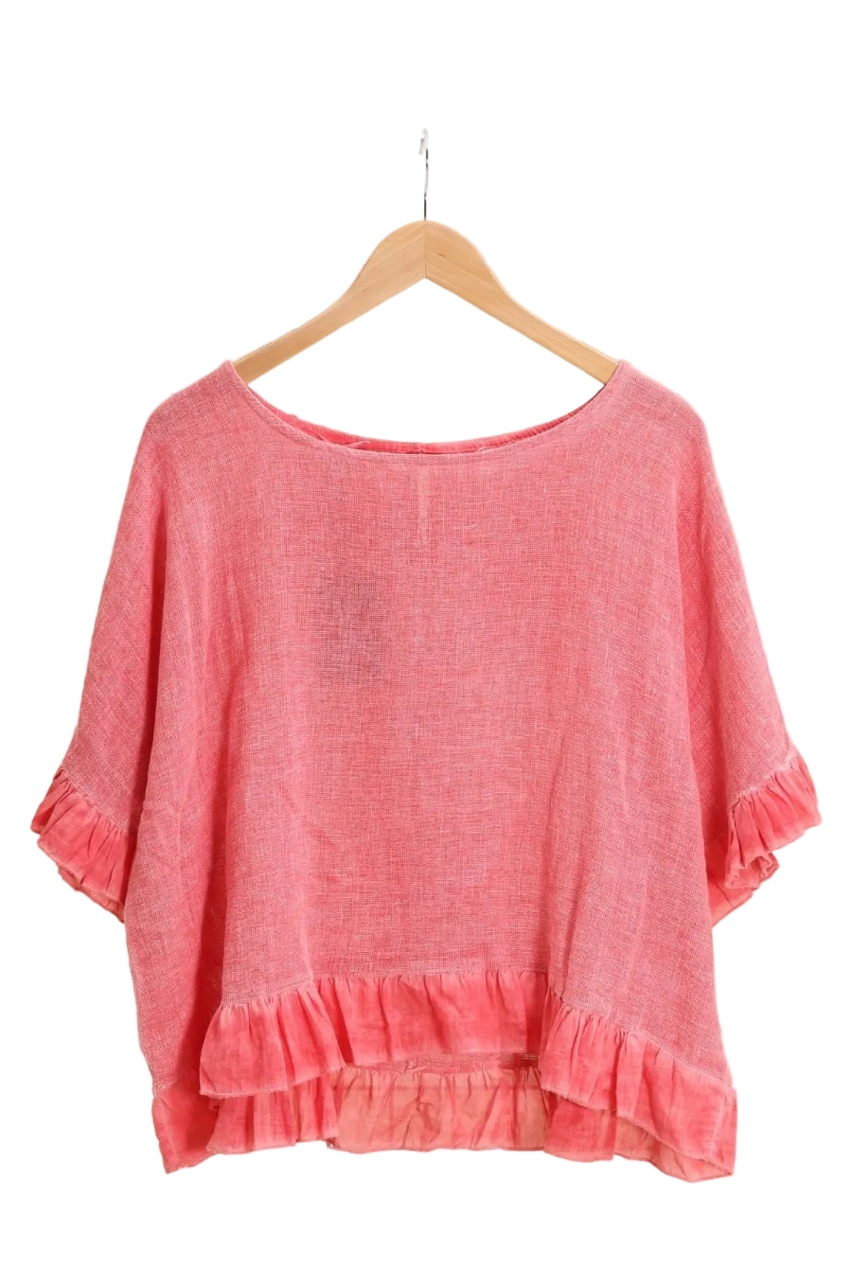 Coral ruffled blouse on a white background
