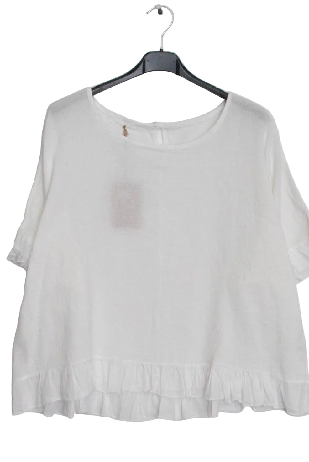 White ruffled blouse on a white background