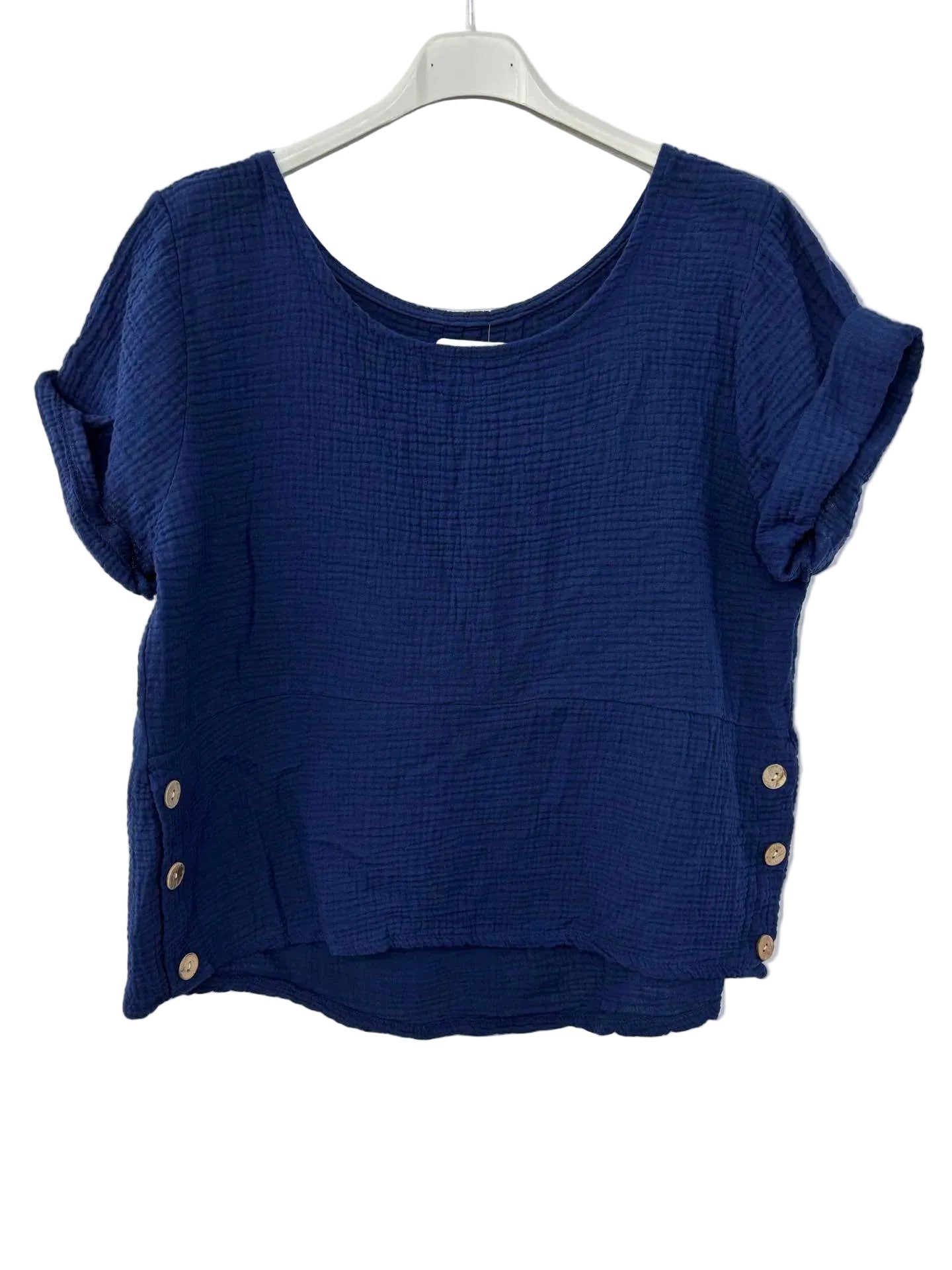 Blue textured top with button details on a white hanger
