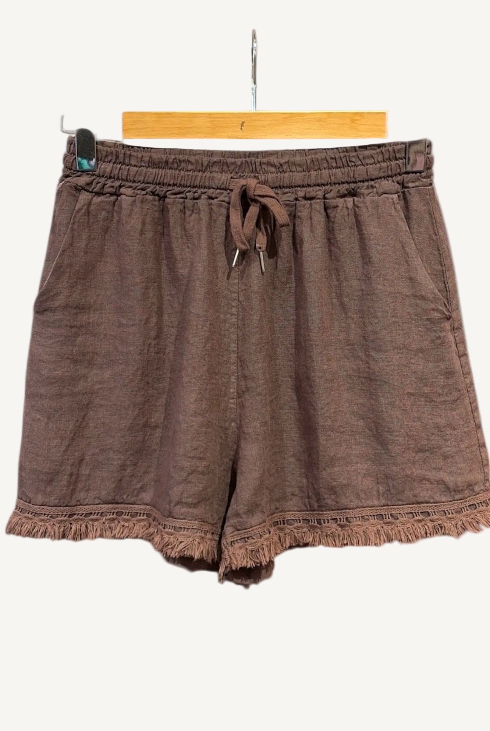 Brown linen shorts with fringe detail
