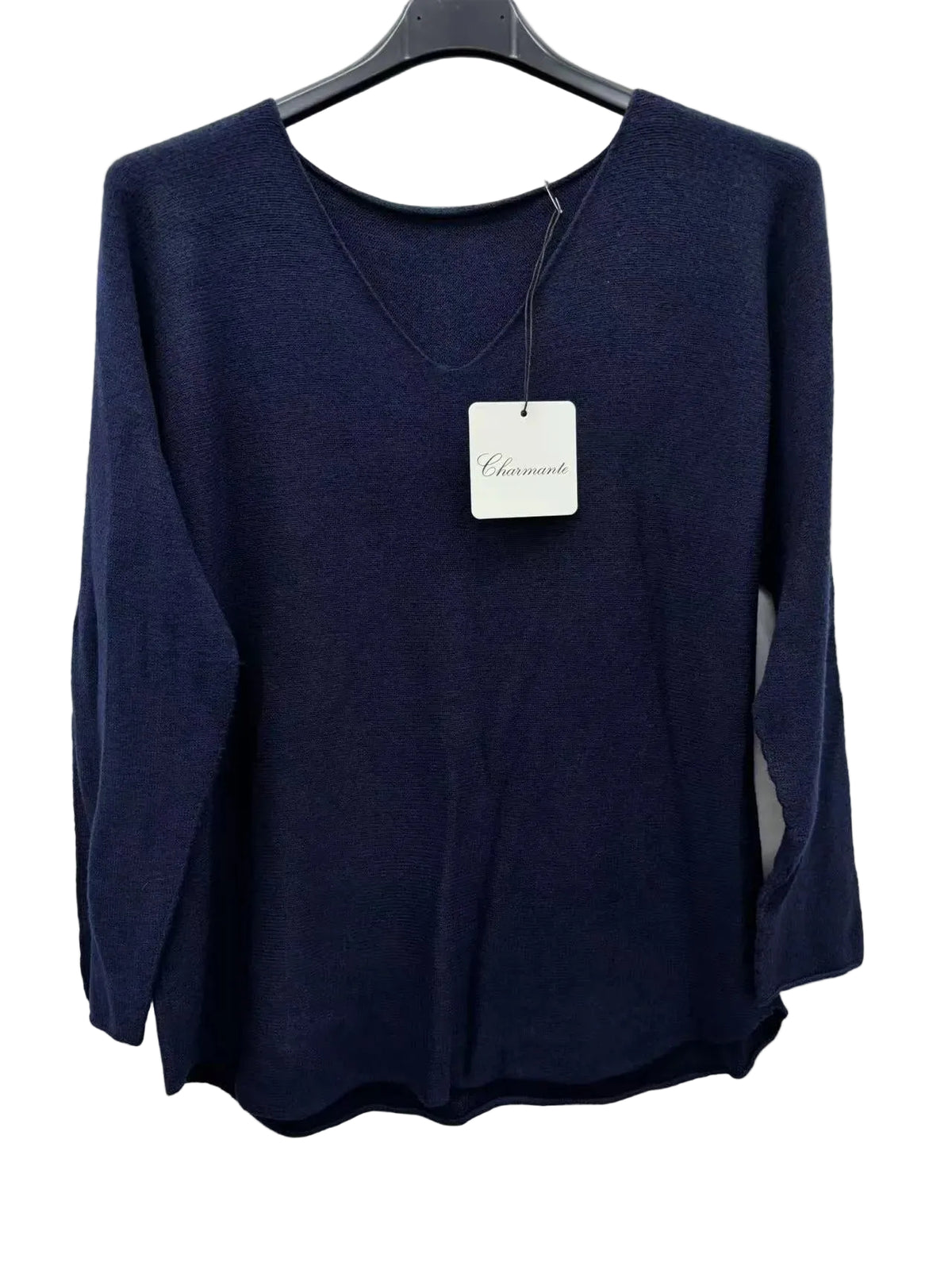 A dark navy blue long-sleeve knit top hanging on a black hanger