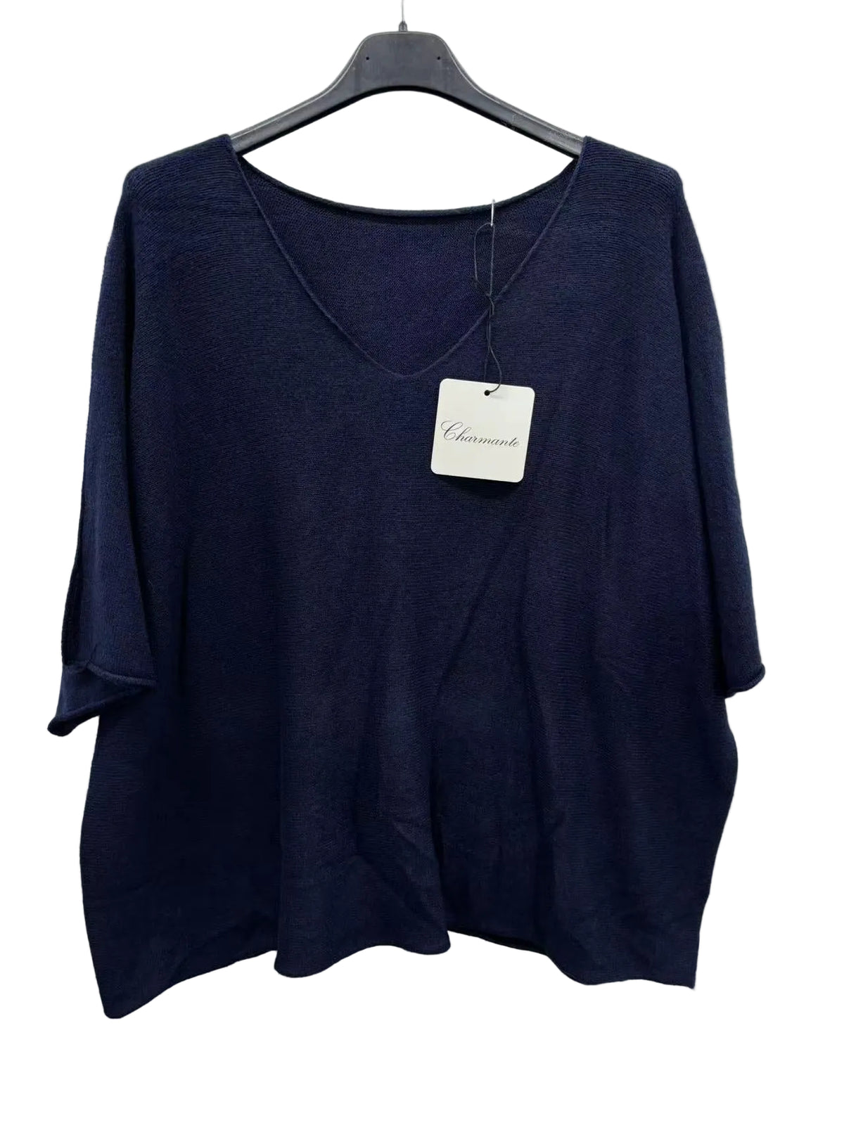 A dark navy blue knit sweater with a v neckline and elbow-length sleeves, hanging on a black hanger.