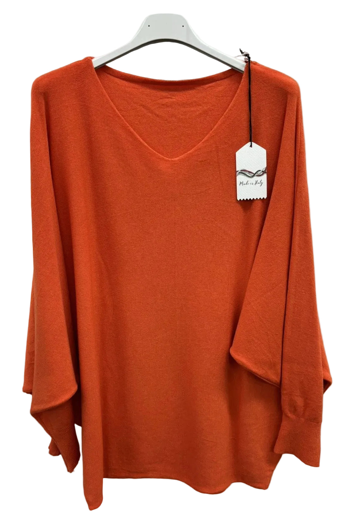 A bright orange long-sleeve V-neck knit top