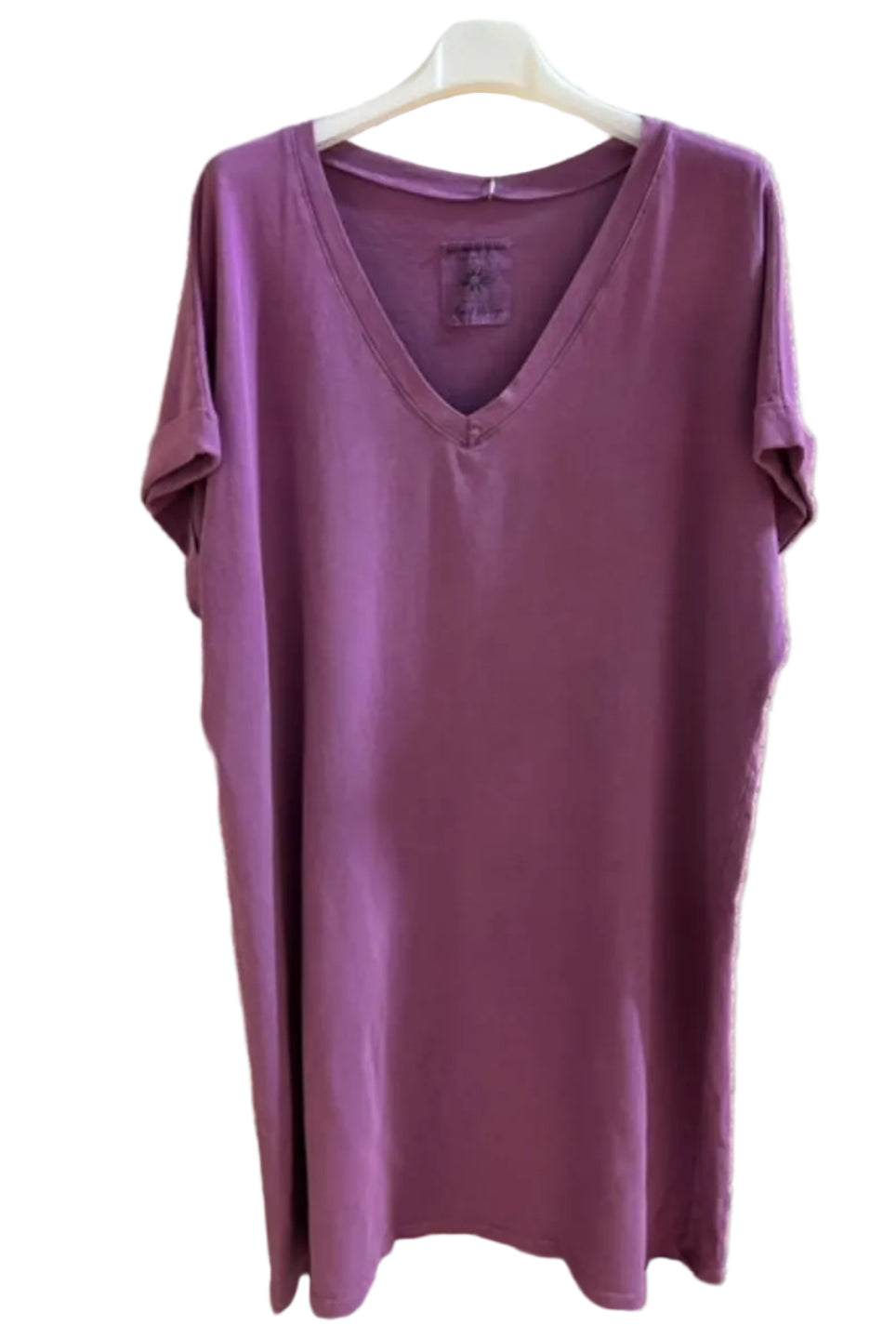 Purple dress on a hanger