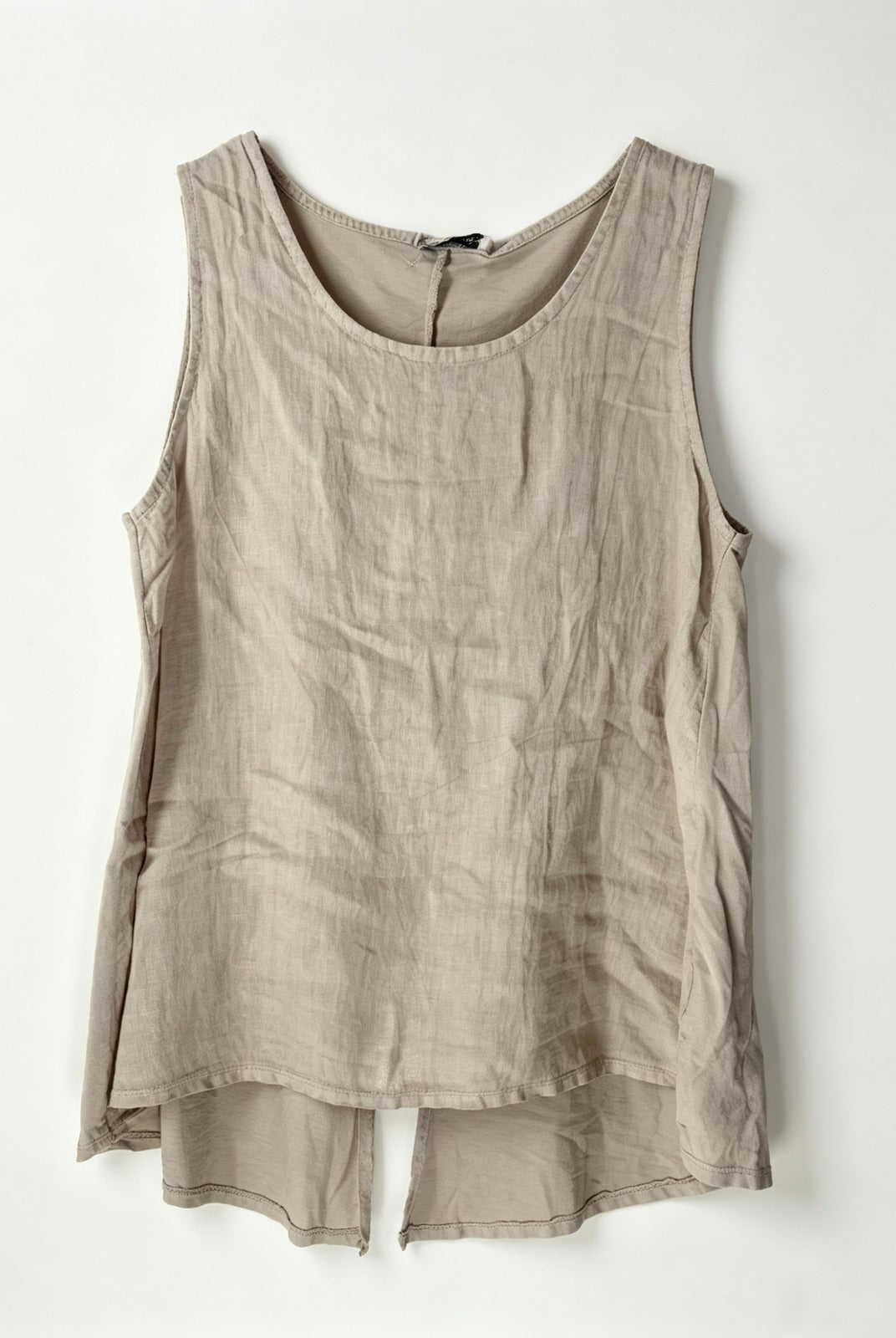 Beige sleeveless top on a white background