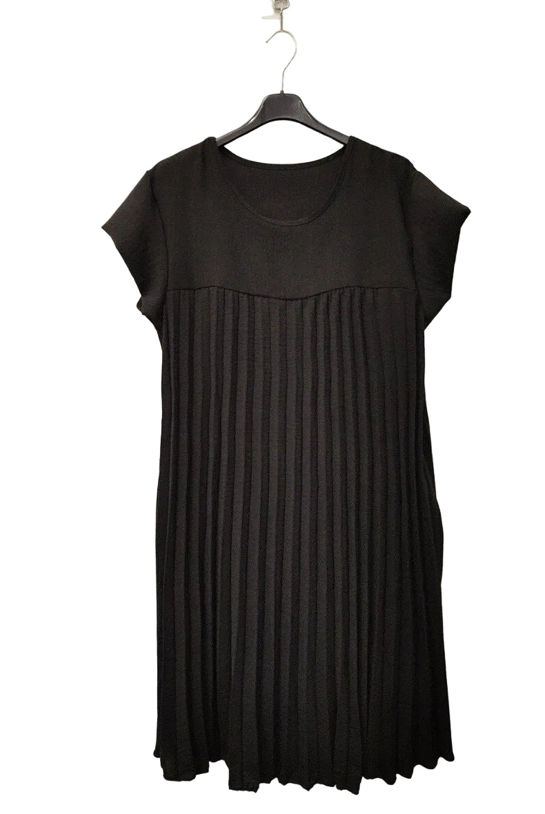 black pleated dress on plain background