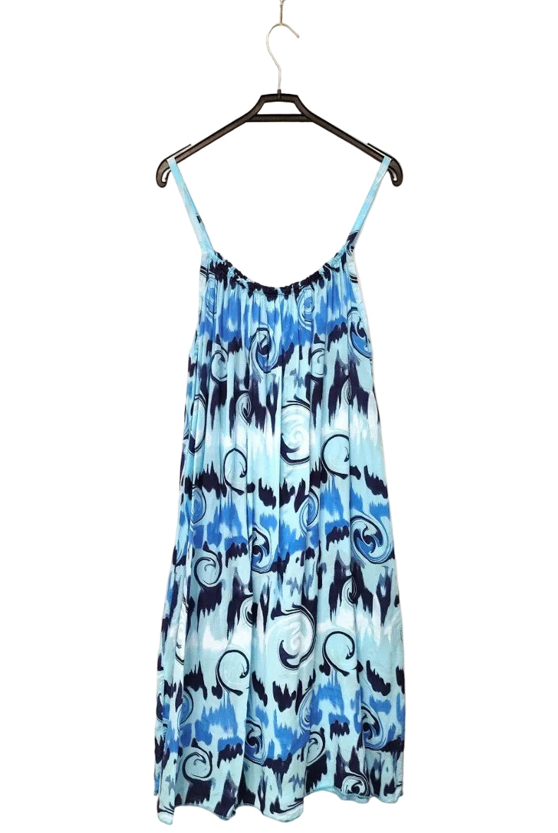 blue printed strappy dress on plan bakground