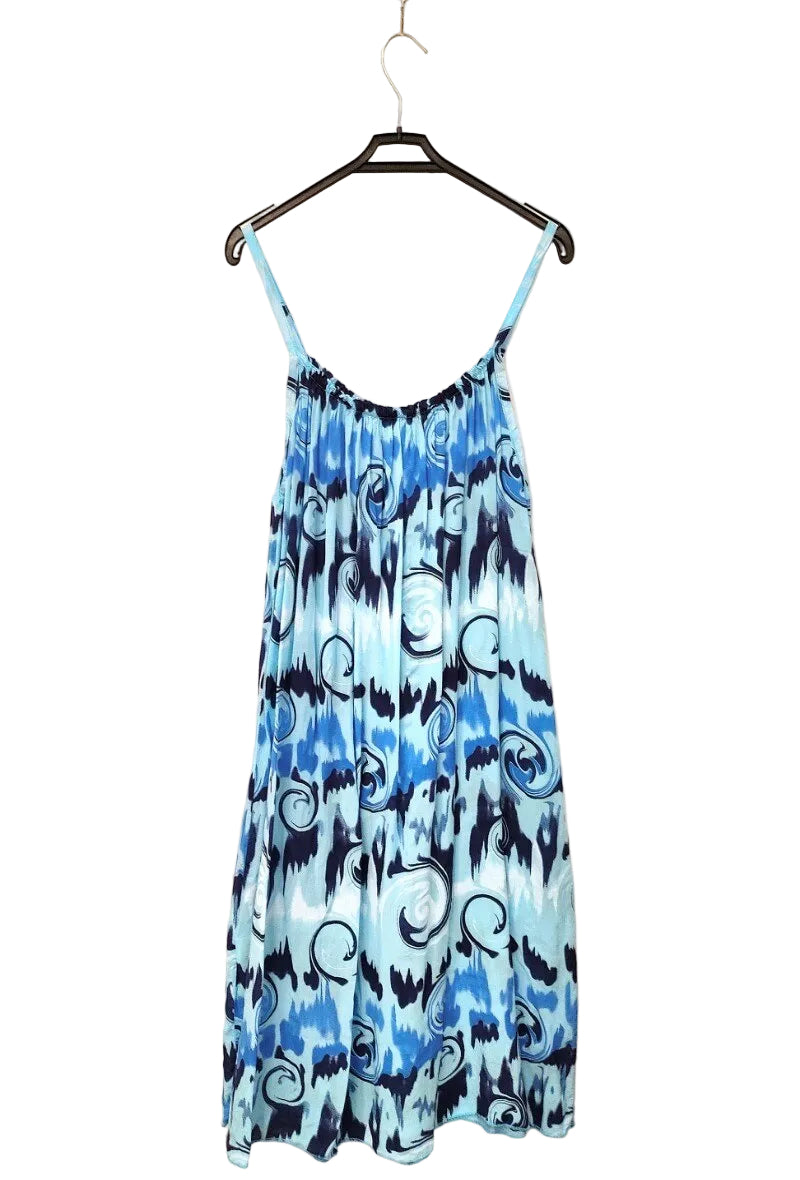 blue printed strappy dress on plan bakground