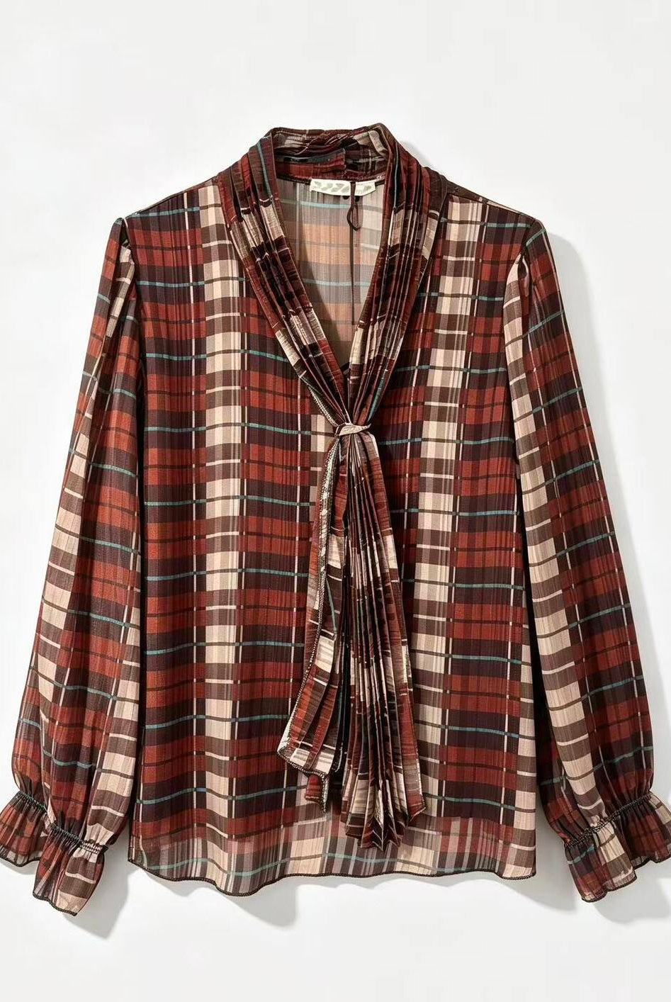 A long-sleeve plaid blouse with a shawl collar, front tie, and ruffled cuffs, shown flat against a white background.