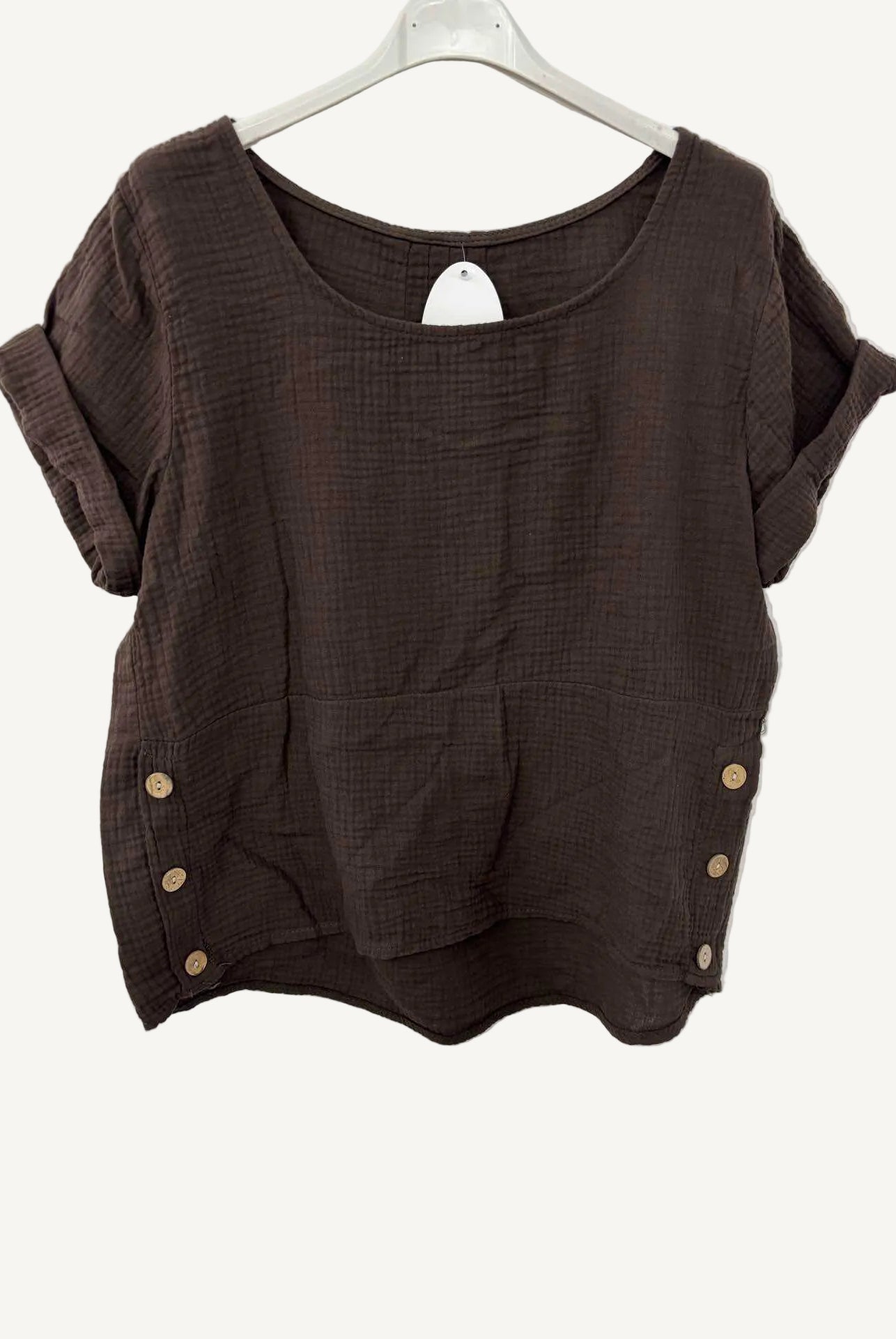Brown textured top with button details on a white background