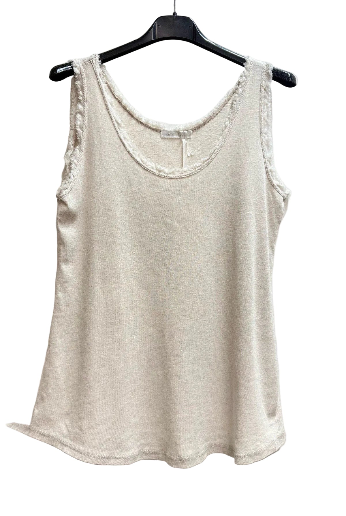 A light beige sleeveless tank top with a scoop neckline and delicate lace trim, hanging on a black hanger against a plain off-white wall.