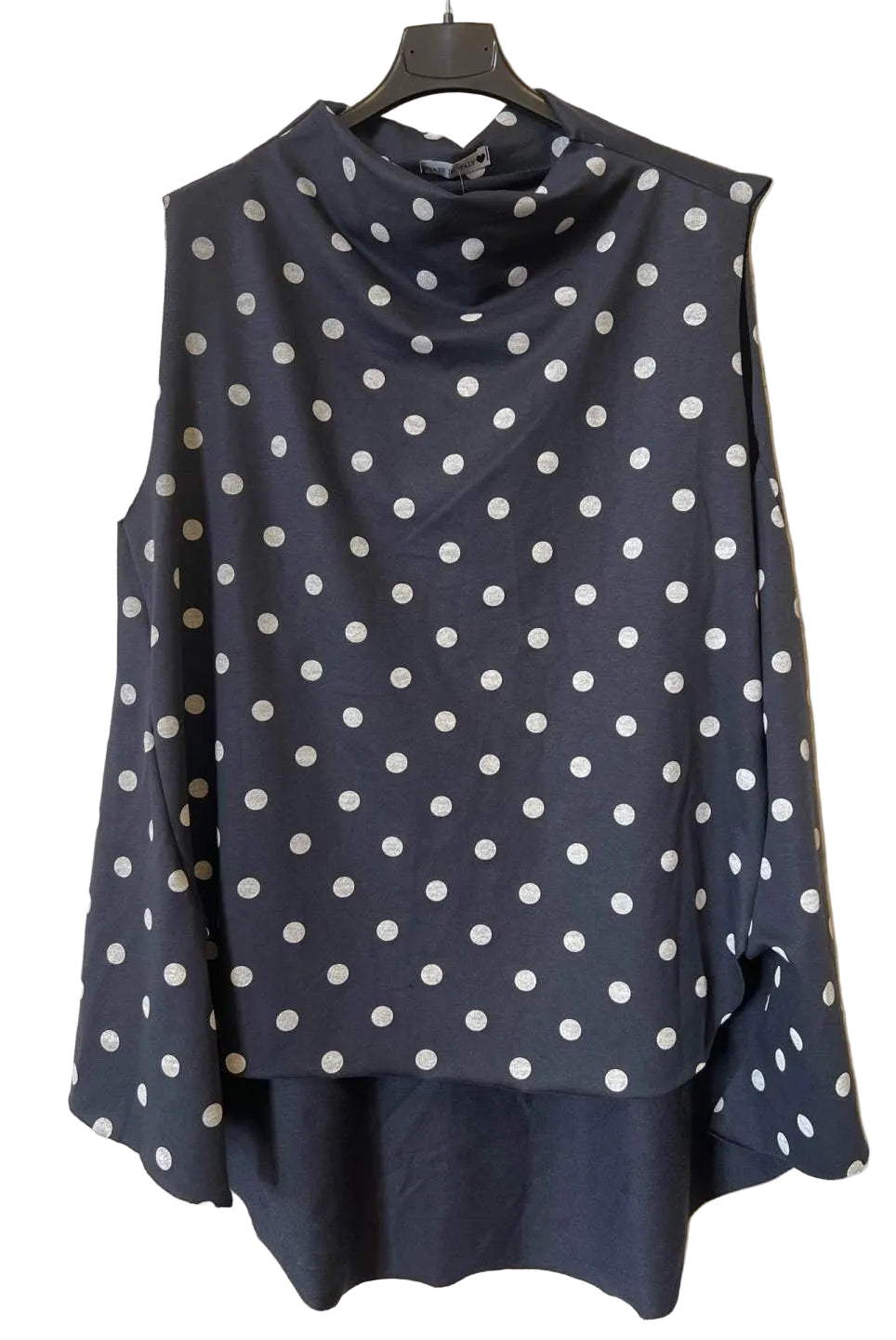 A navy blue long-sleeve top with white polka dots