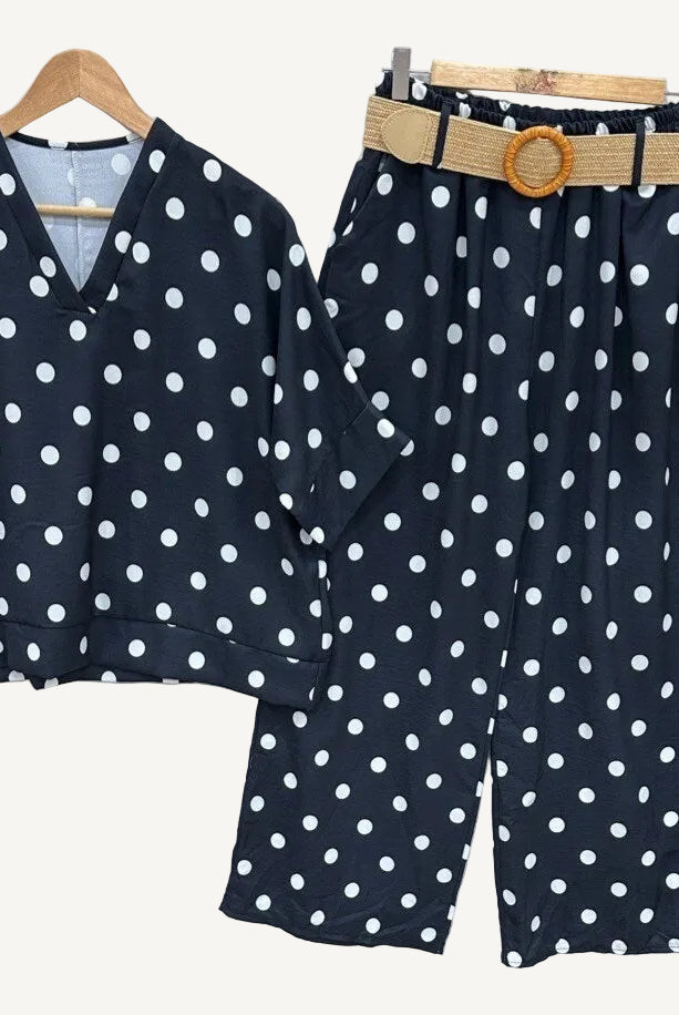 Black outfit with white polka dots
