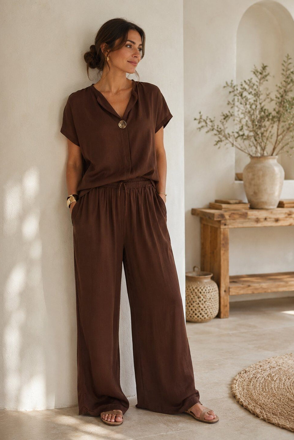 two piece outfit of trousers and top in chocolate