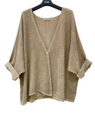 Beige kimono-style top on a hanger against a white background