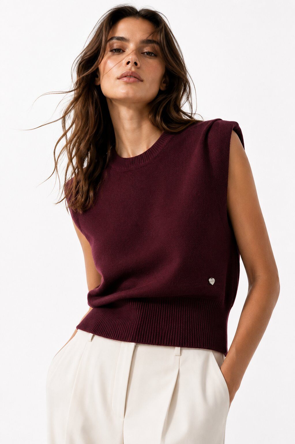 Burgundy sleeveless knit with padded shoulder
