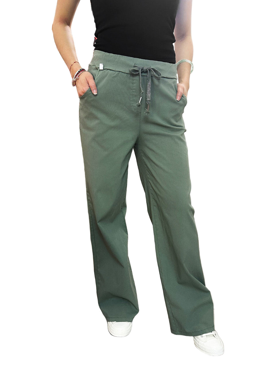 Khaki pants worn by a person on a white background