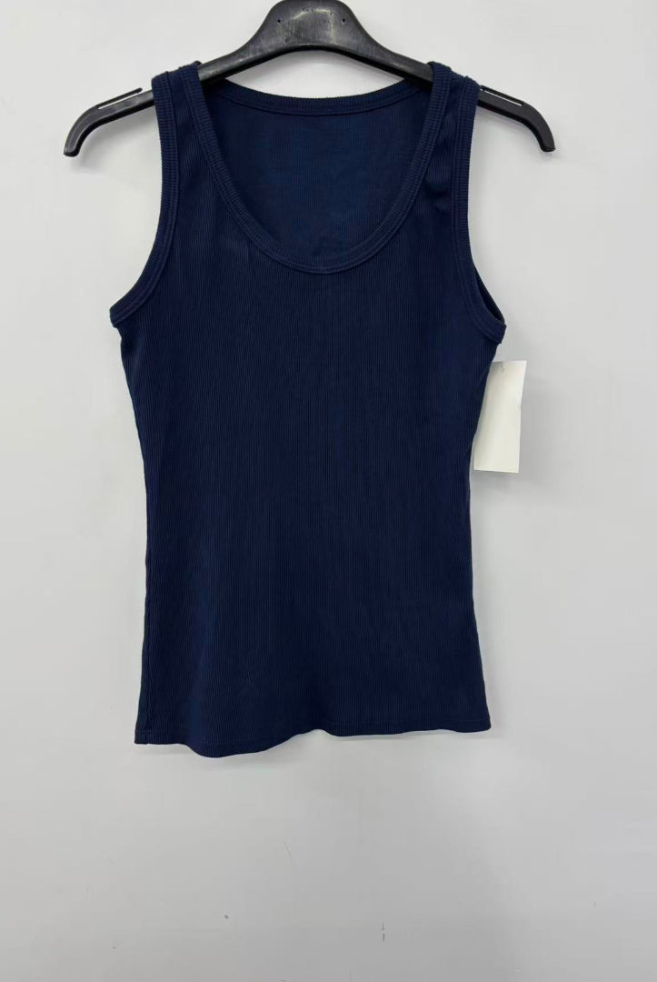 Navy blue tank top on a hanger with a white background