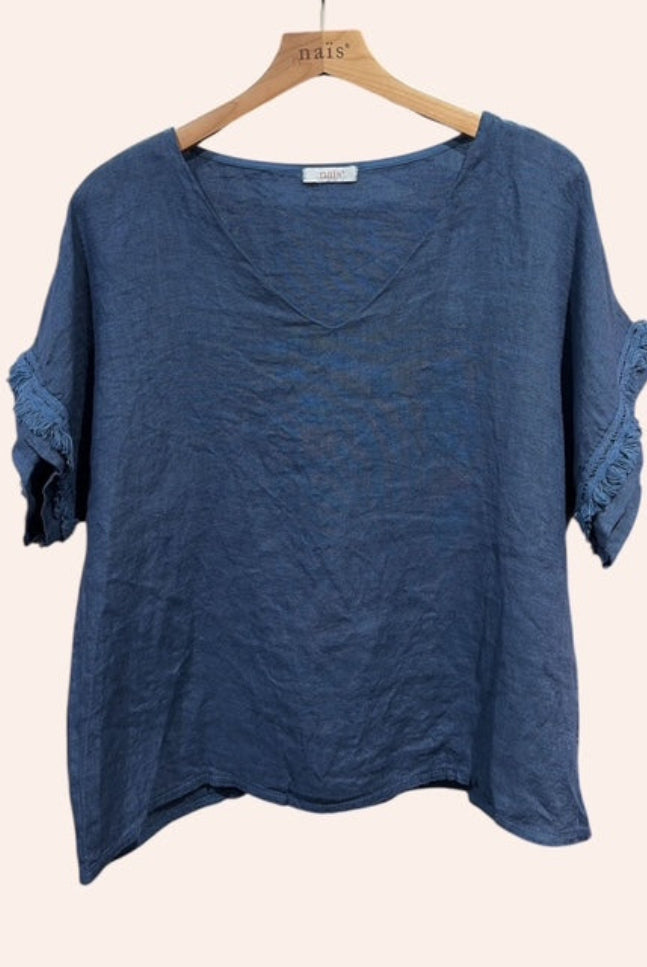 Navy Blue linen v neck top on a hanger against a white background