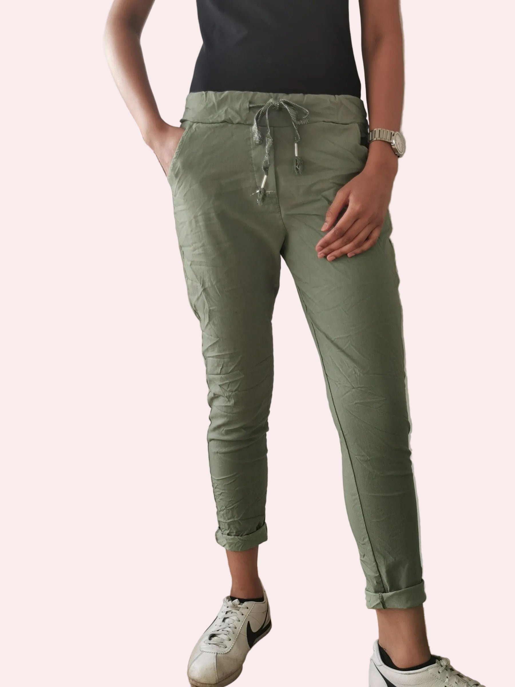 Person wearing green pants