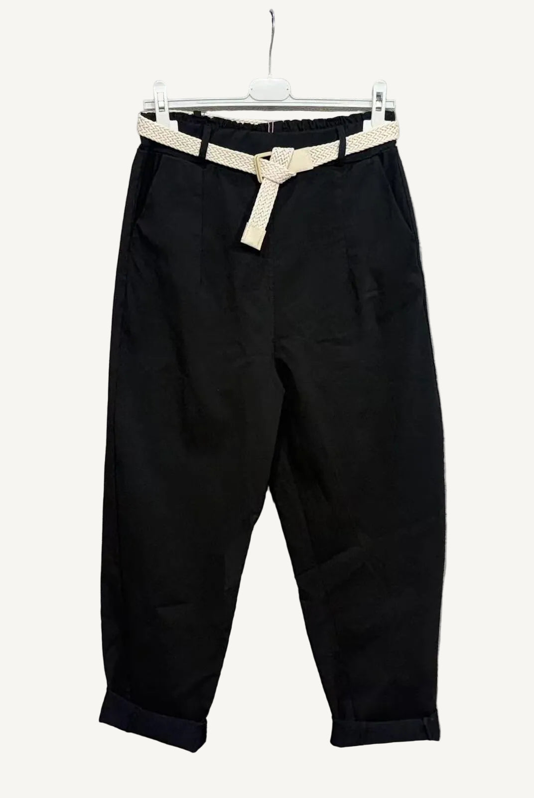 Black pants with a beige belt