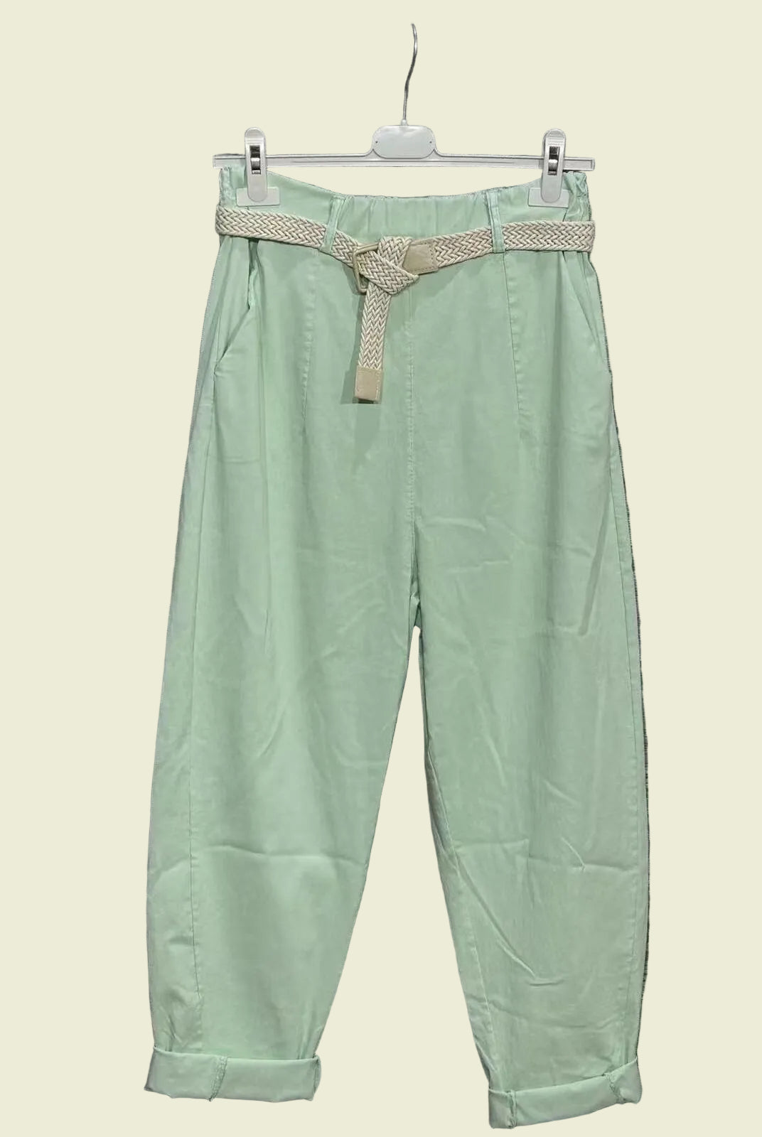Light green pants with a belt