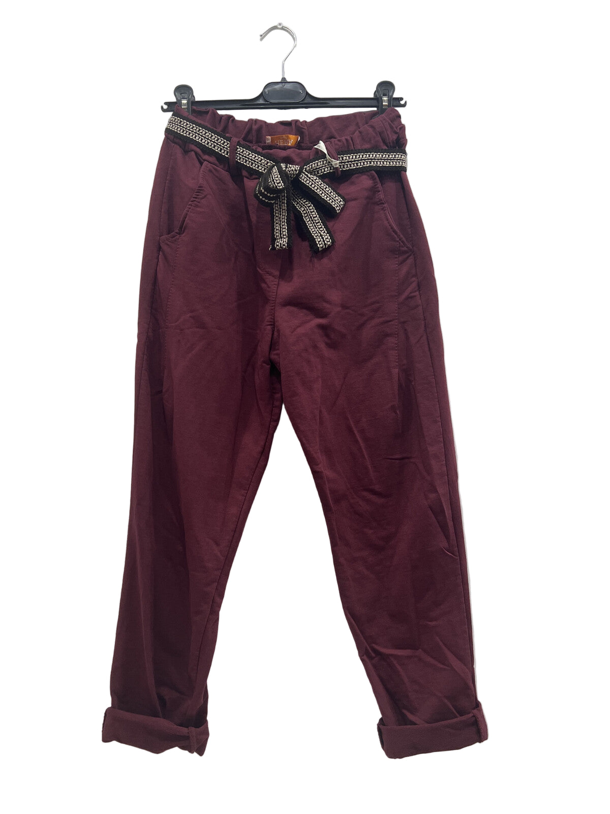 Maroon pants with a decorative belt on a white background