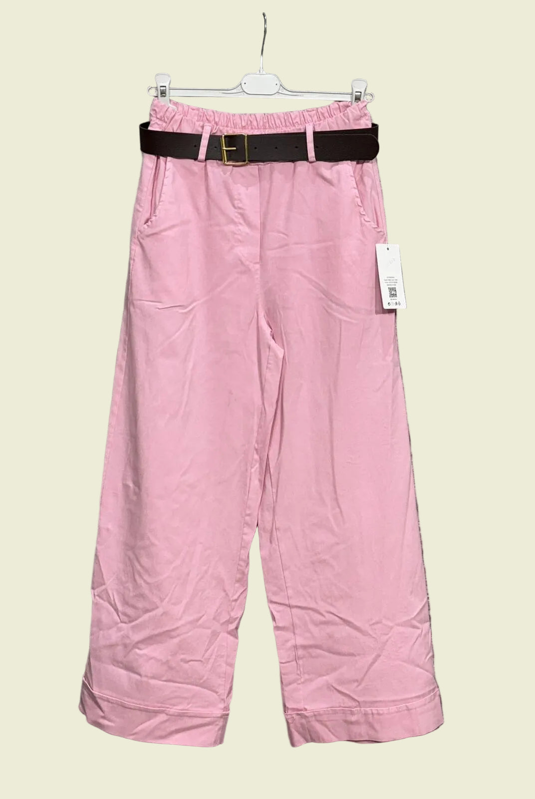 Pink pants with a black belt