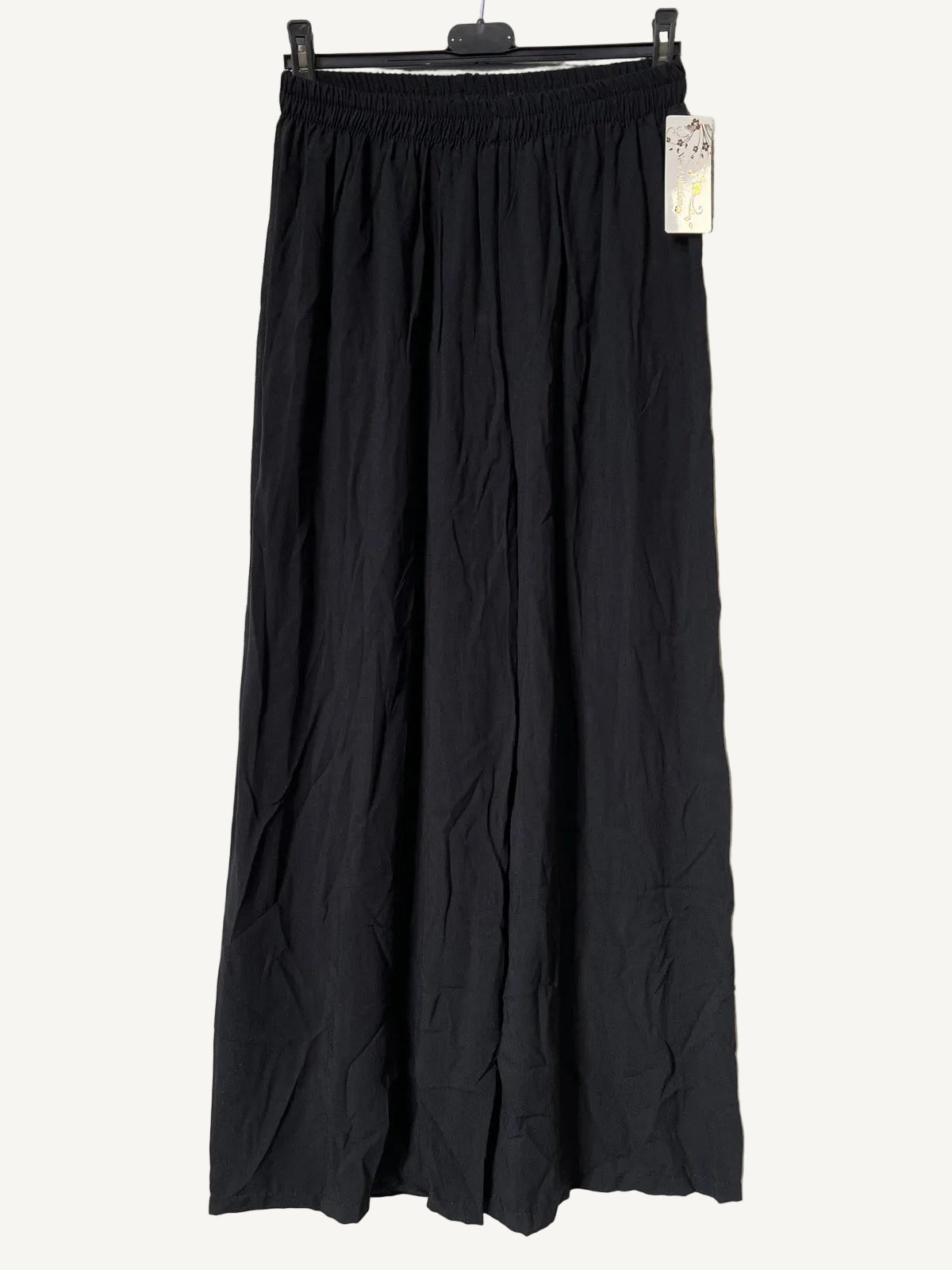 Black wide-leg pants on a hanger