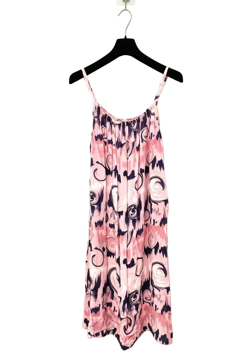 pink strappy dress on plain background