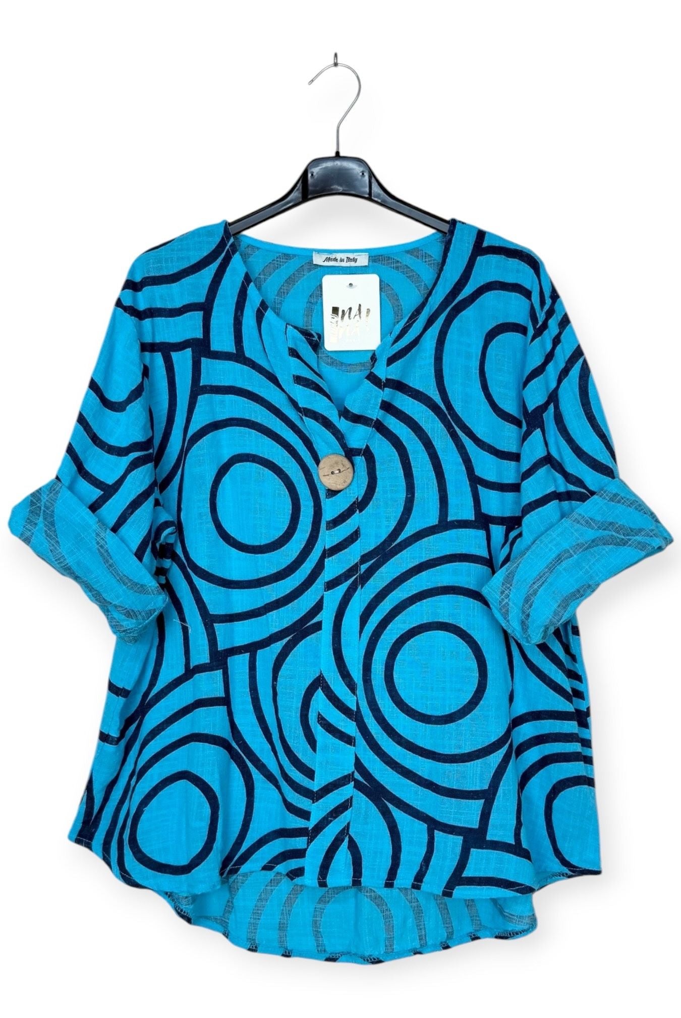 cyan printed top with feature large button