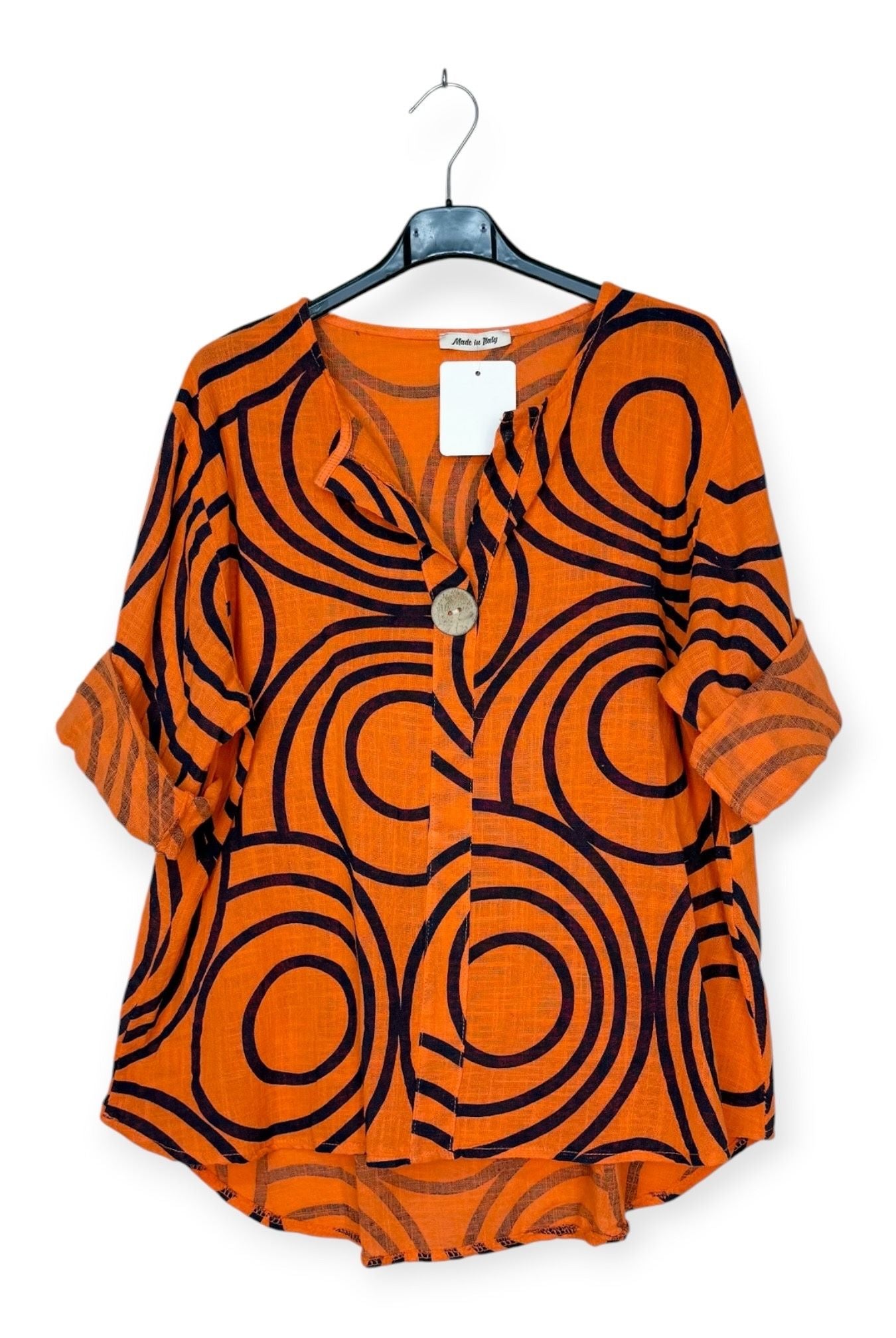 Printed orange top with feature button