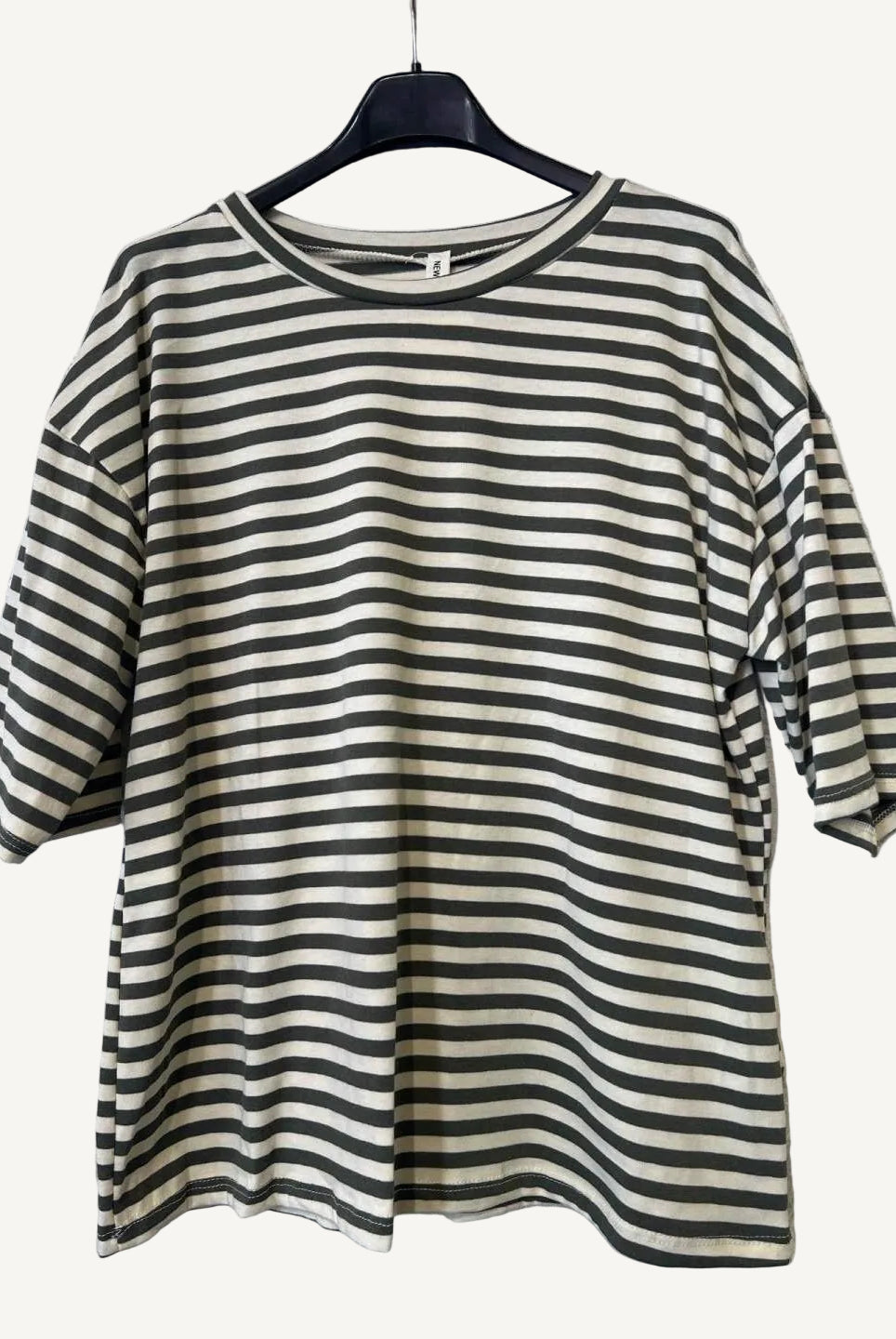 Striped T shirt on a hanger