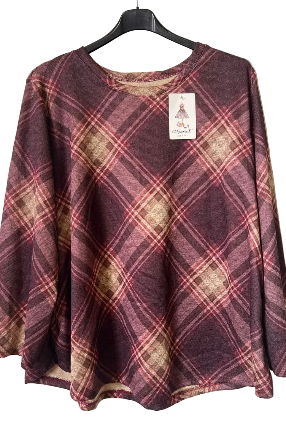 A women's long-sleeve top with a diagonal plaid pattern in burgundy, pink, and beige