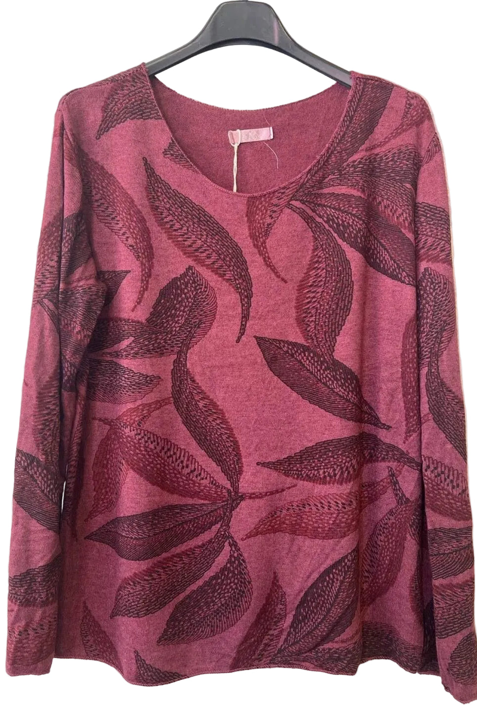 A women's long-sleeve scoop neck top in burgundy, featuring a dark burgundy leaf pattern across the front,
