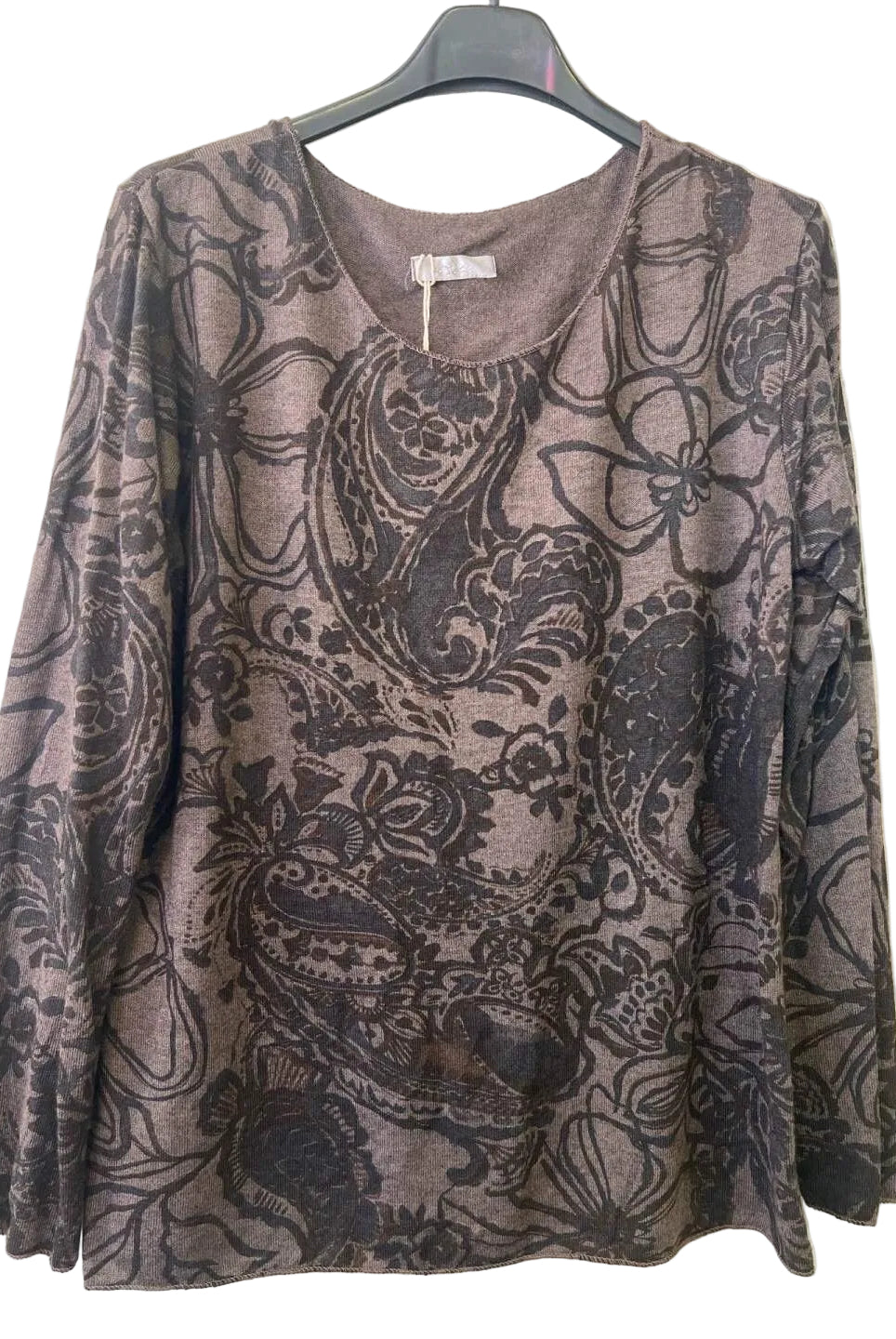 A women's long-sleeve top with a brown and black paisley floral pattern,