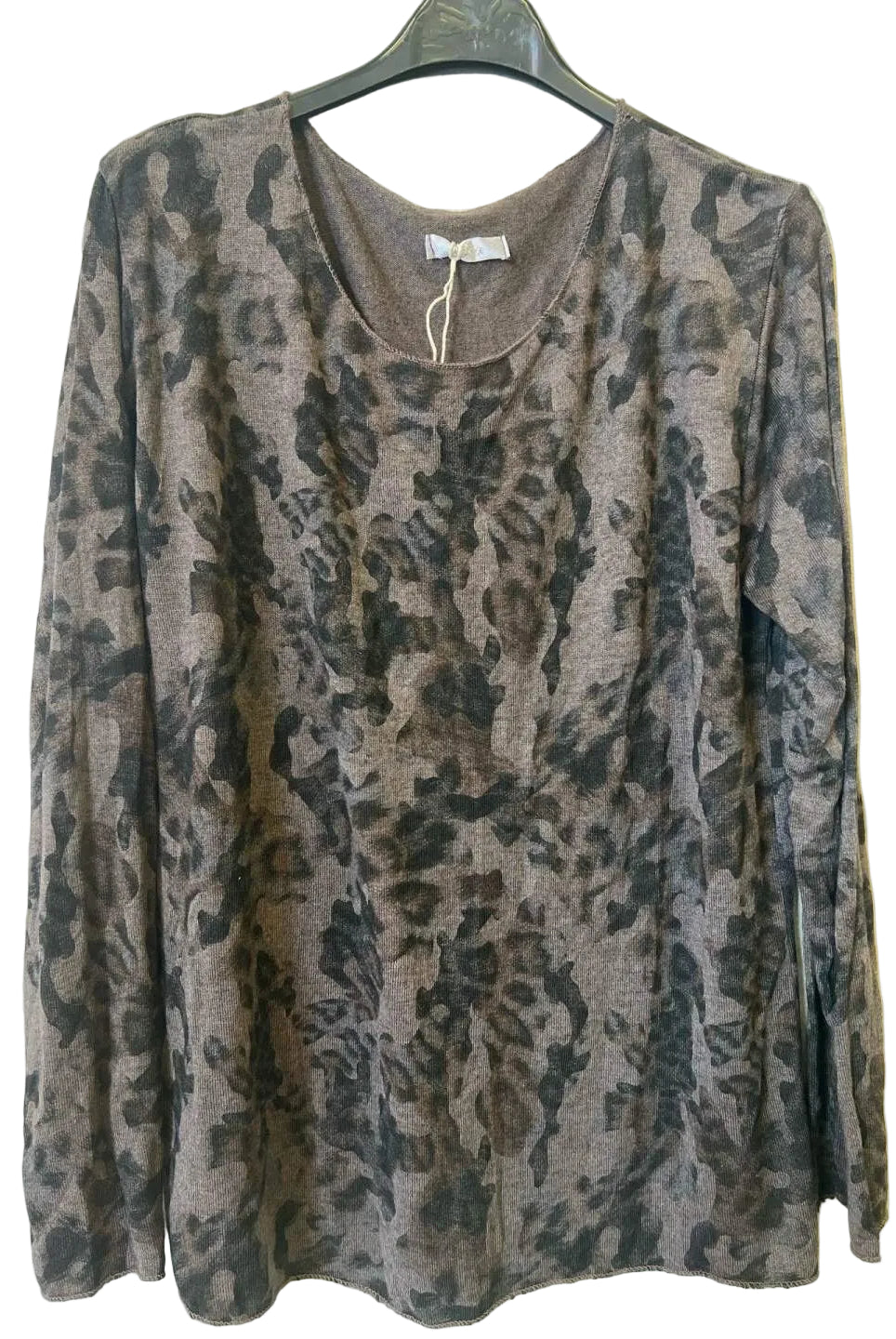 A long-sleeve crewneck top with an abstract camouflage print in brown, gray, and black