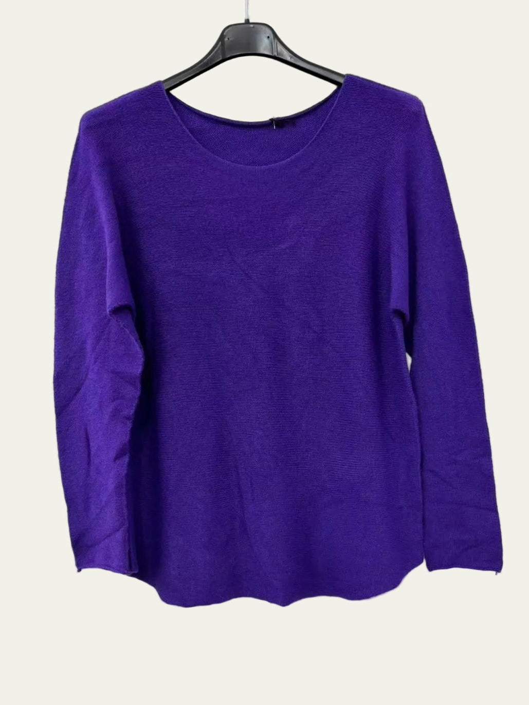 A purple long-sleeve knit sweater with round neck