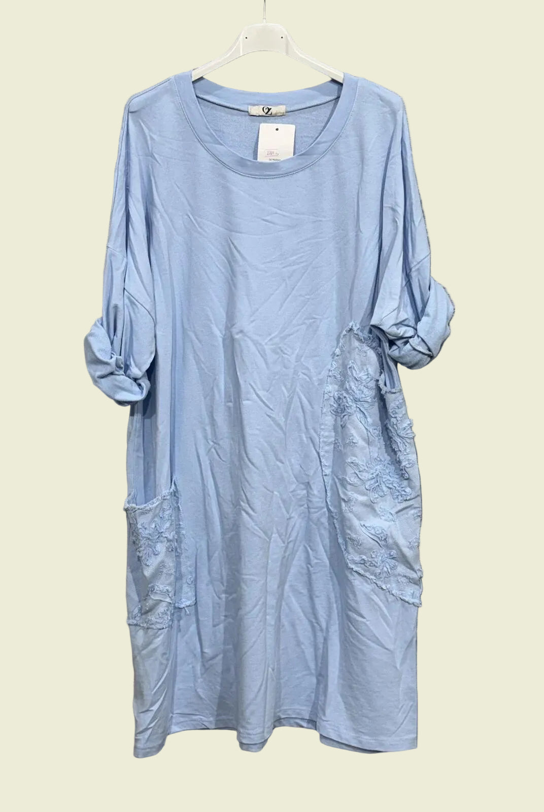 Light blue dress on a hanger